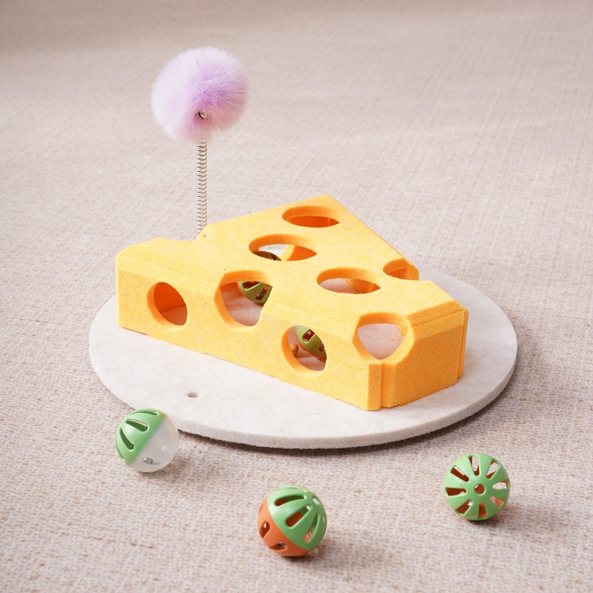 Cat Puzzle Toy with Ball and Spring-Loaded Wand set up for play indoors